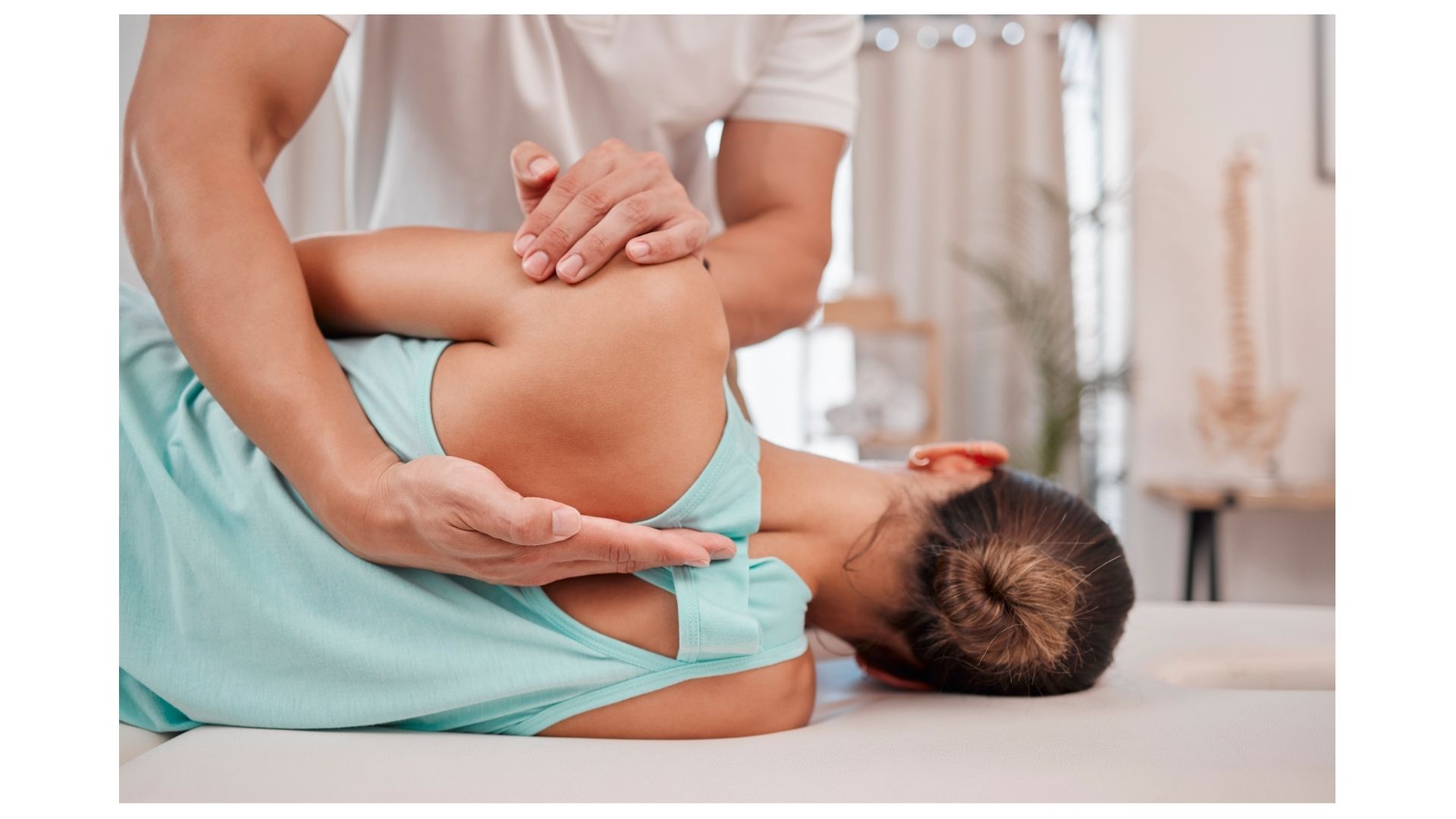 Chiropractor performing a shoulder adjustment on an athletic patient at Birch Chiropractic & Rehab in North Kansas City Chiropractor performing a shoulder adjustment on an athletic patient at Birch Chiropractic & Rehab in North Kansas City